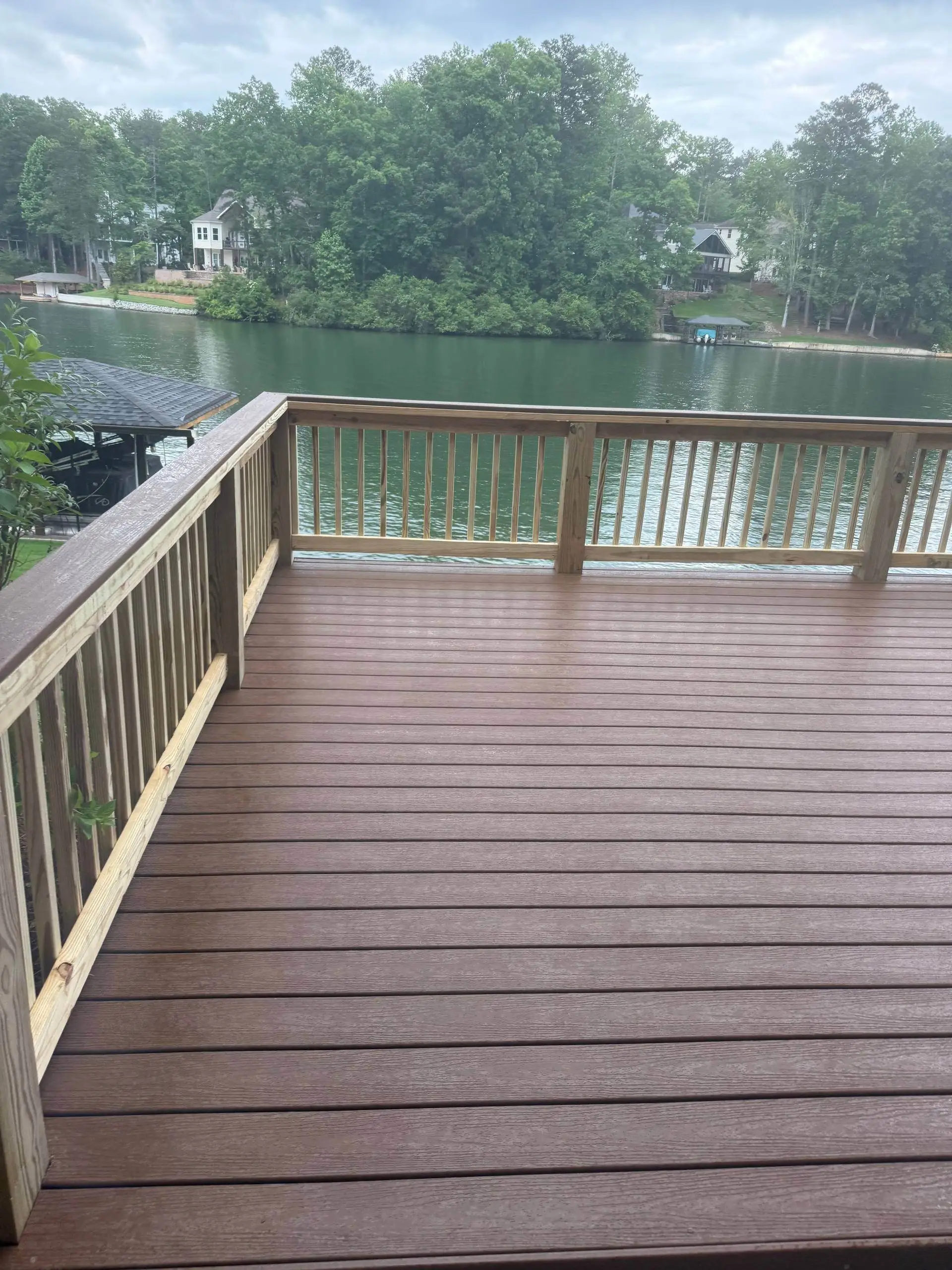 Composite deck and rail with a lake panorama behind