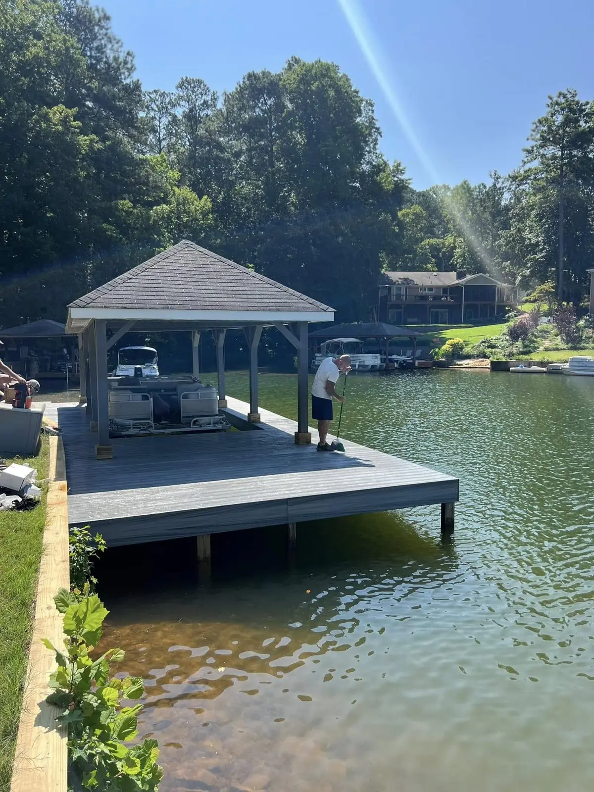 Finished covered dock and walkway with composite decking