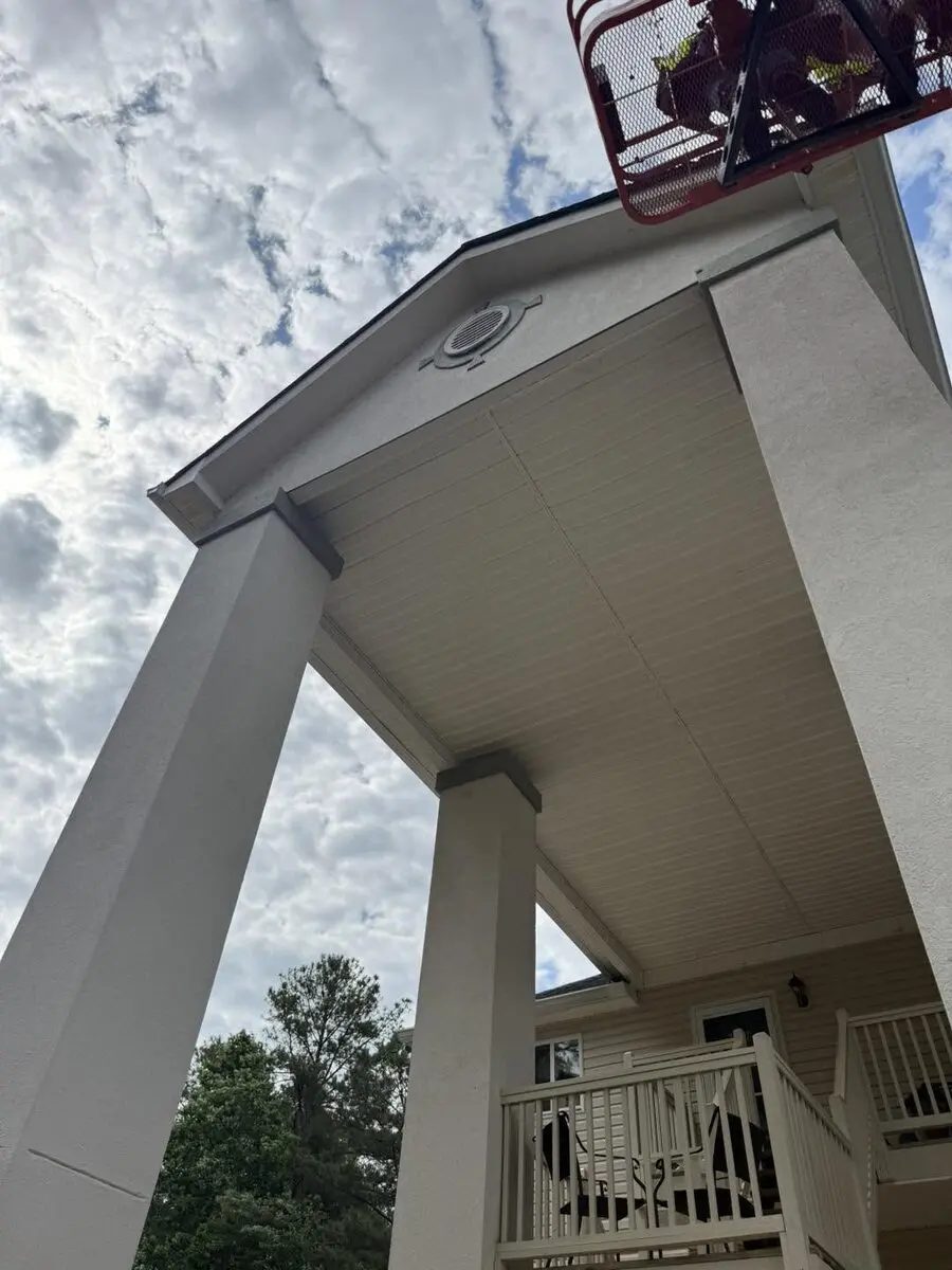 Freshly painted portico ceiling and columns viewed from below